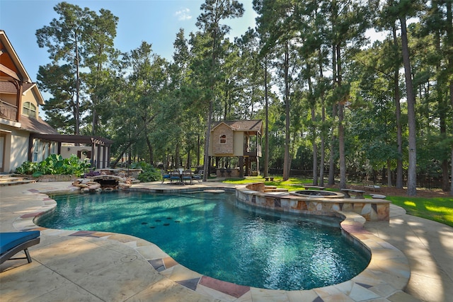 view of pool featuring an in ground hot tub and a patio area