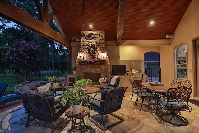 view of patio featuring an outdoor living space with a fireplace