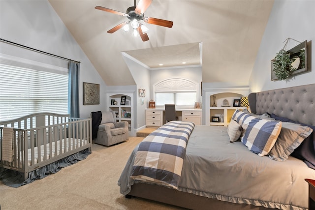 carpeted bedroom with lofted ceiling and ceiling fan