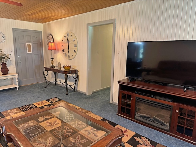 living room featuring carpet floors and wood ceiling