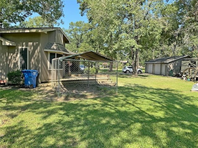 view of yard with an outdoor structure