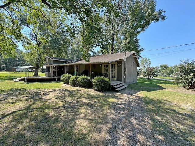 exterior space featuring a yard