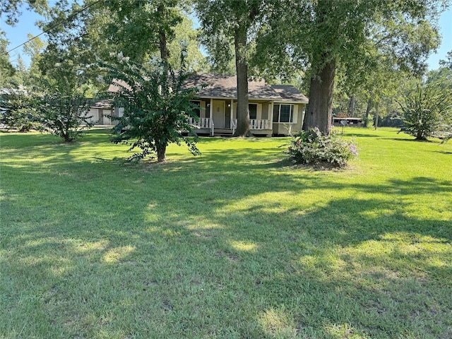 view of yard with a porch