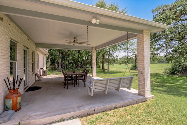 view of patio featuring ceiling fan