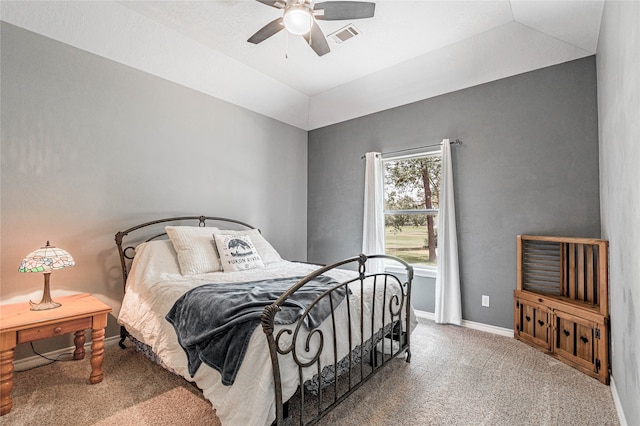 carpeted bedroom featuring ceiling fan and lofted ceiling