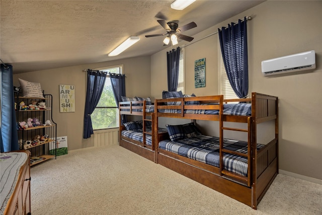 carpeted bedroom featuring ceiling fan, vaulted ceiling, a textured ceiling, and an AC wall unit