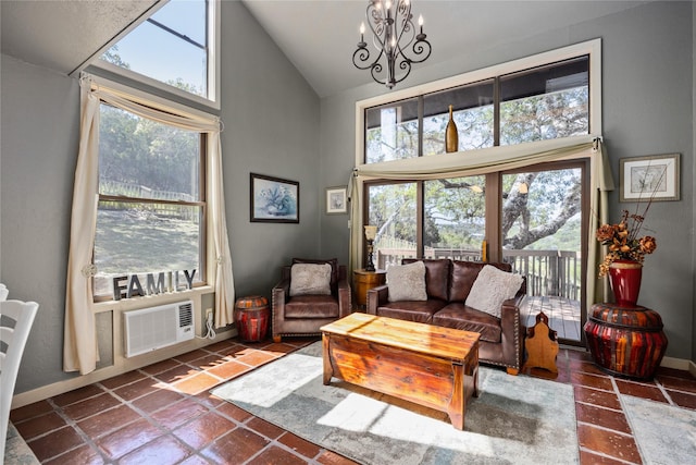 living room featuring an inviting chandelier and high vaulted ceiling