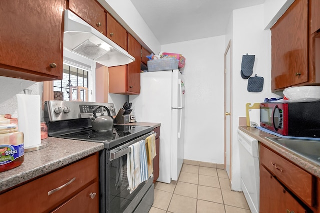 kitchen featuring stainless steel range with electric cooktop, white dishwasher, and light tile patterned floors