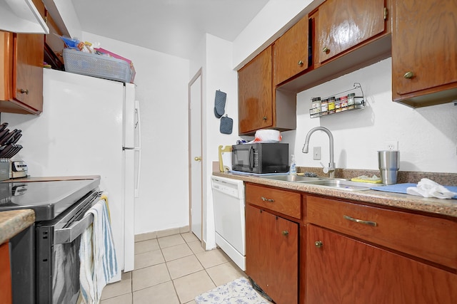 kitchen with electric stove, light tile patterned floors, dishwasher, custom exhaust hood, and sink