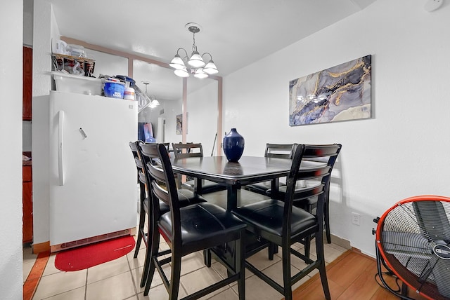 dining room with a chandelier