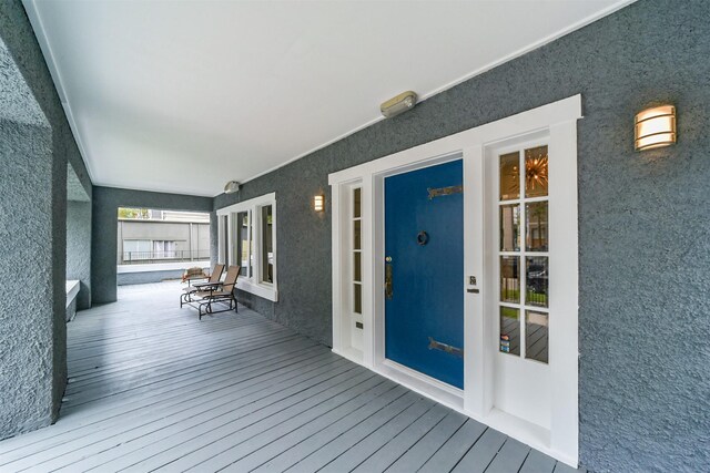 wooden deck with french doors