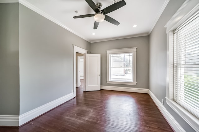 spare room featuring crown molding, ceiling fan, and dark hardwood / wood-style flooring