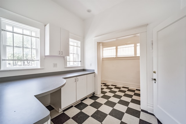 kitchen with white cabinets