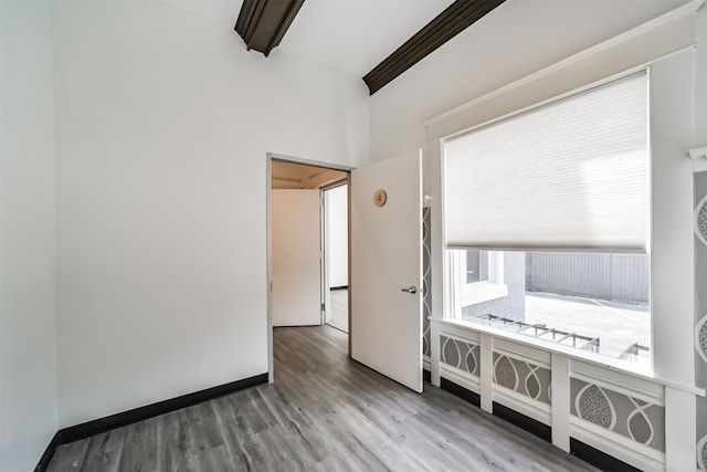 unfurnished bedroom featuring hardwood / wood-style floors