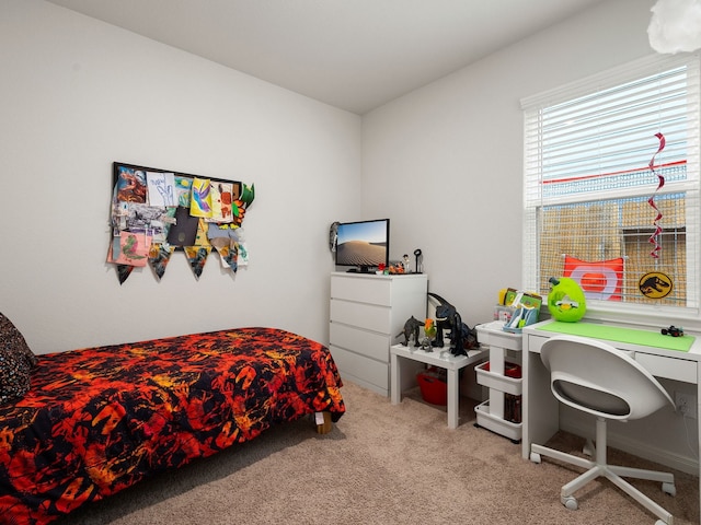 bedroom featuring light colored carpet