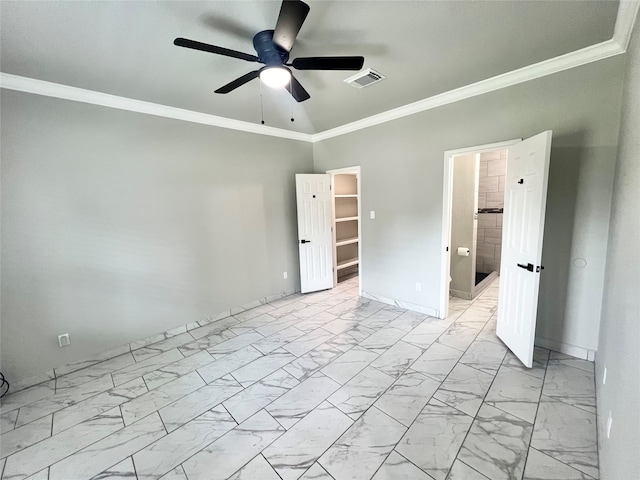 unfurnished bedroom featuring ceiling fan, light tile patterned floors, ornamental molding, and a spacious closet