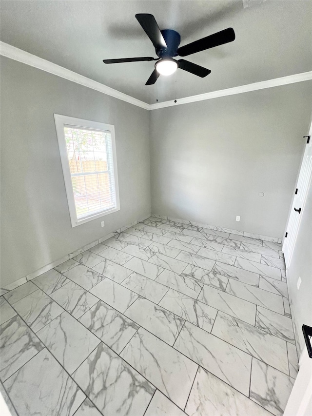 tiled spare room featuring ceiling fan and crown molding