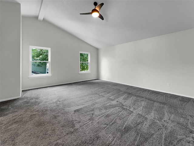 carpeted spare room featuring ceiling fan and vaulted ceiling with beams