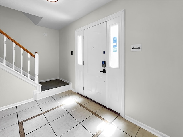 entryway featuring light tile patterned floors