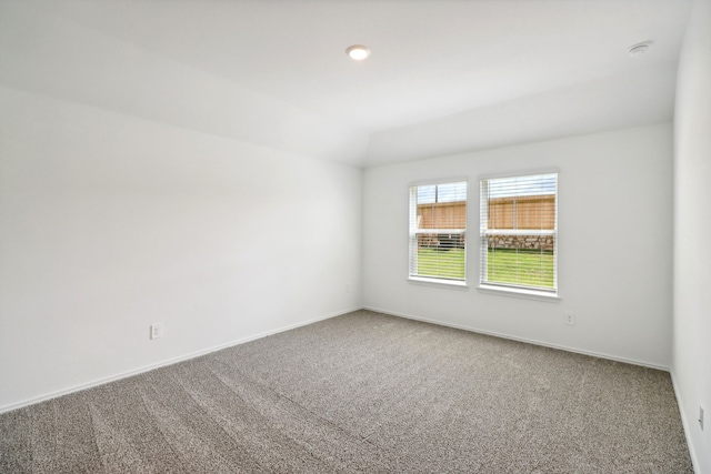 unfurnished room with carpet flooring