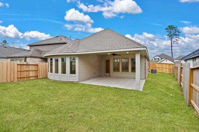 back of house featuring ceiling fan, central AC unit, a yard, and a patio area