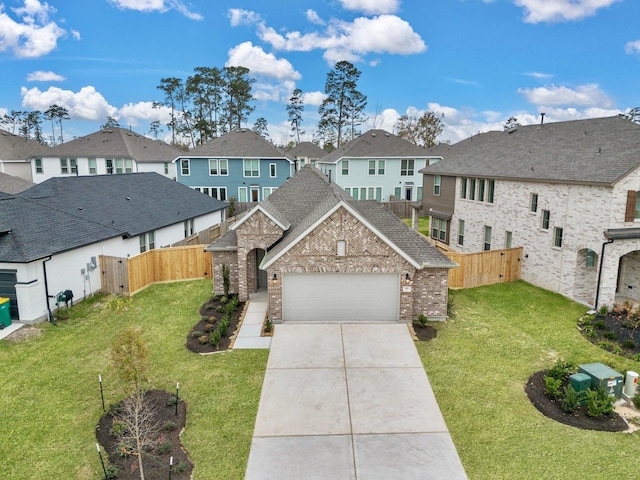 view of front facade featuring a front yard and a garage