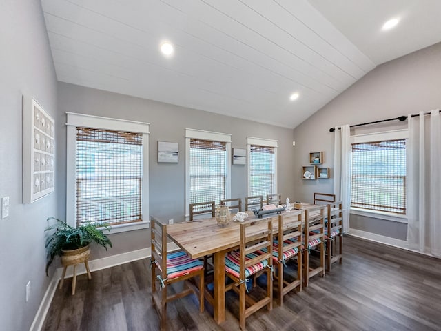 dining area with plenty of natural light, baseboards, lofted ceiling, and dark wood-style flooring