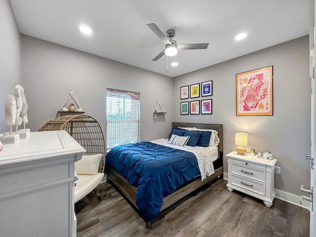 bedroom featuring ceiling fan and hardwood / wood-style flooring