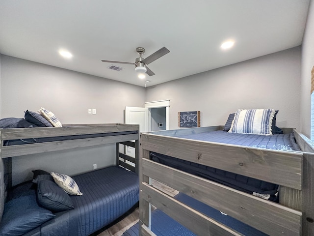 bedroom featuring visible vents, recessed lighting, ceiling fan, and dark wood-style flooring