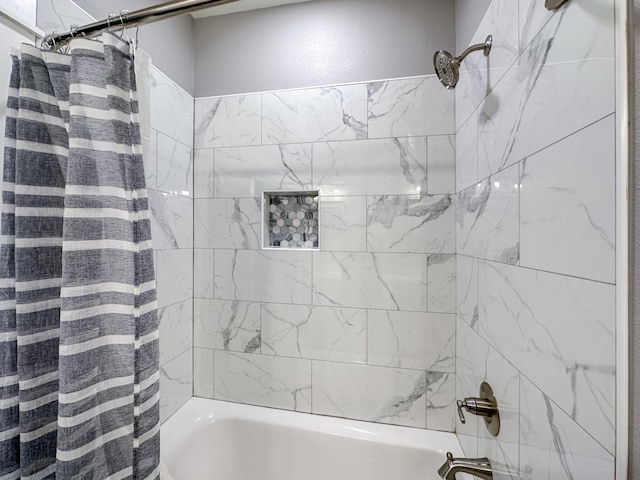 bathroom with shower / tub combo