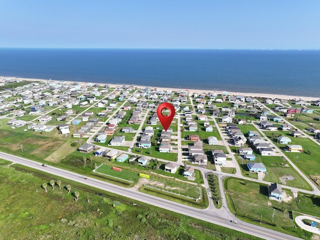 birds eye view of property featuring a residential view and a water view