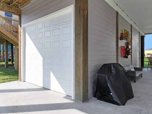 garage with covered porch