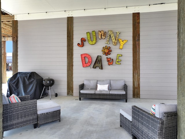 view of patio / terrace featuring an outdoor hangout area and a grill