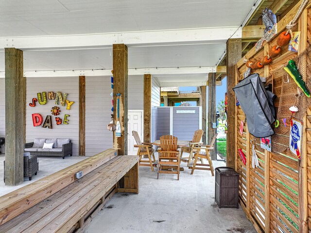 interior space with unfinished concrete flooring