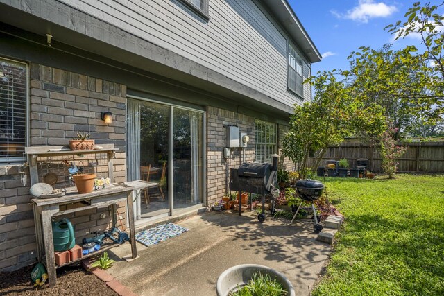 view of patio with a grill