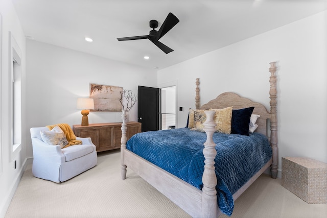 bedroom featuring ceiling fan and light colored carpet