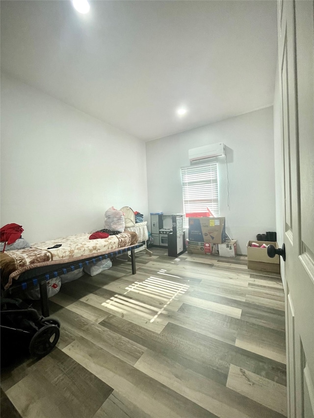 living area with hardwood / wood-style flooring