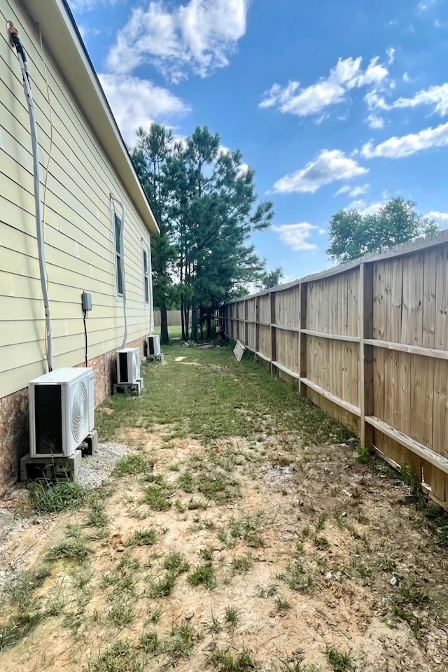 view of yard with ac unit