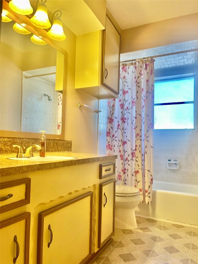 full bathroom featuring vanity, toilet, tile patterned floors, and shower / bath combination with curtain