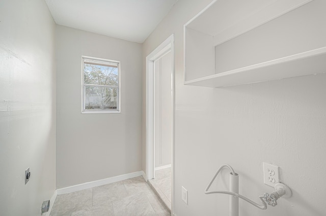 laundry room featuring electric dryer hookup