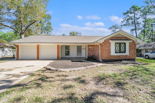 single story home featuring a garage