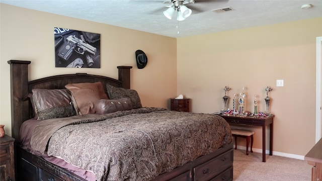 bedroom with light carpet and ceiling fan