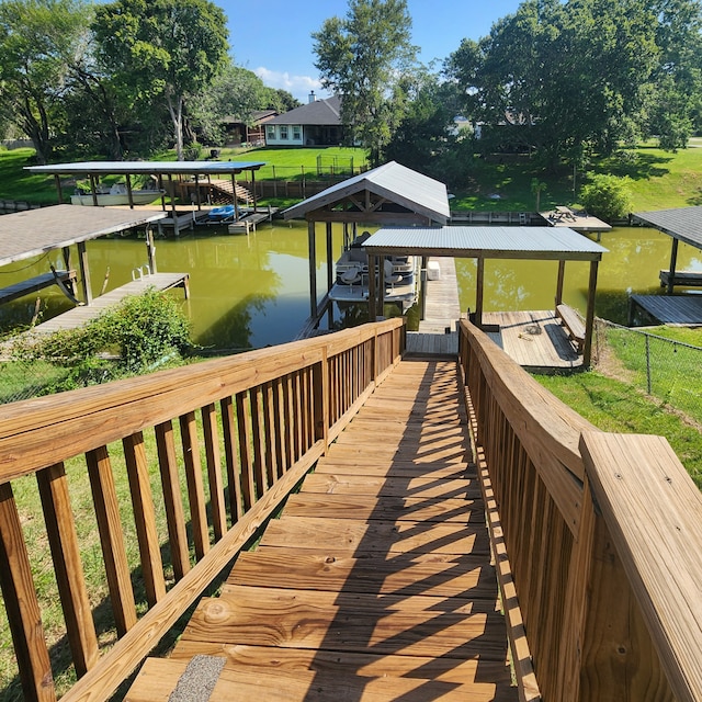 dock area featuring a water view