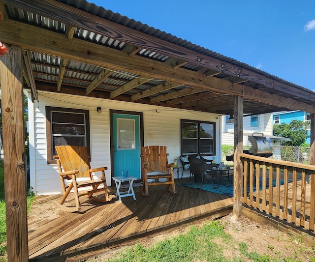 wooden deck featuring a porch