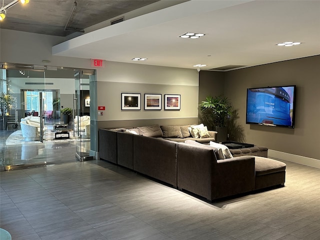 living room featuring tile patterned floors