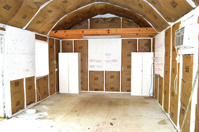 storage room featuring a wall mounted air conditioner