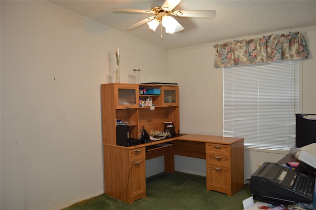 office space featuring dark carpet, ornamental molding, and ceiling fan