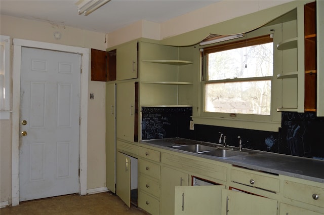 kitchen featuring light tile patterned floors, tasteful backsplash, and sink