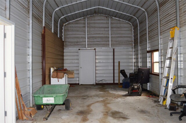 garage featuring a carport