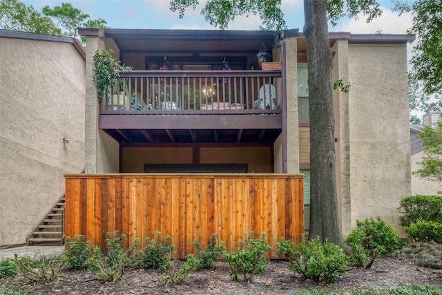 exterior space featuring a balcony